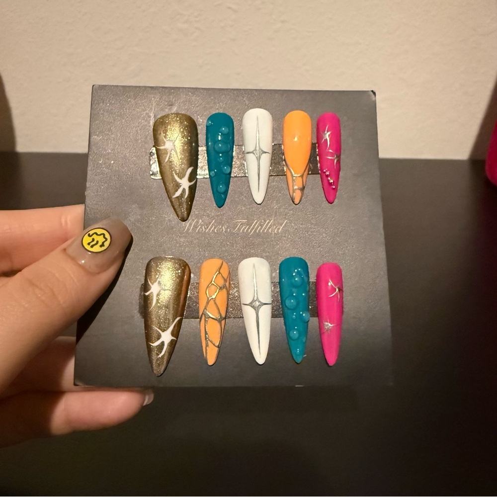 Colorful Press-On Nails with Silver and Gold Accents